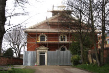 The pediment and roof under repair
